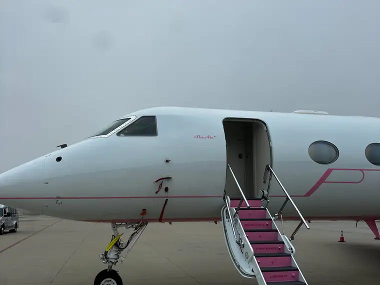 Private jet exterior detail with the air-stair down