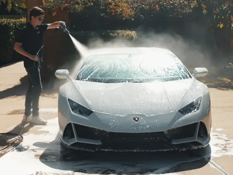 Lamborghini Huracán being hand-washed with foam