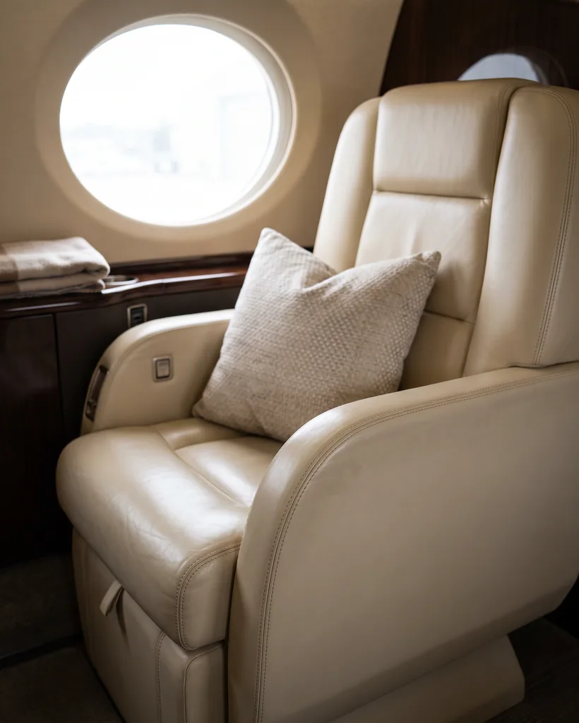 Pristine detailed leather seats in a private jet cabin
